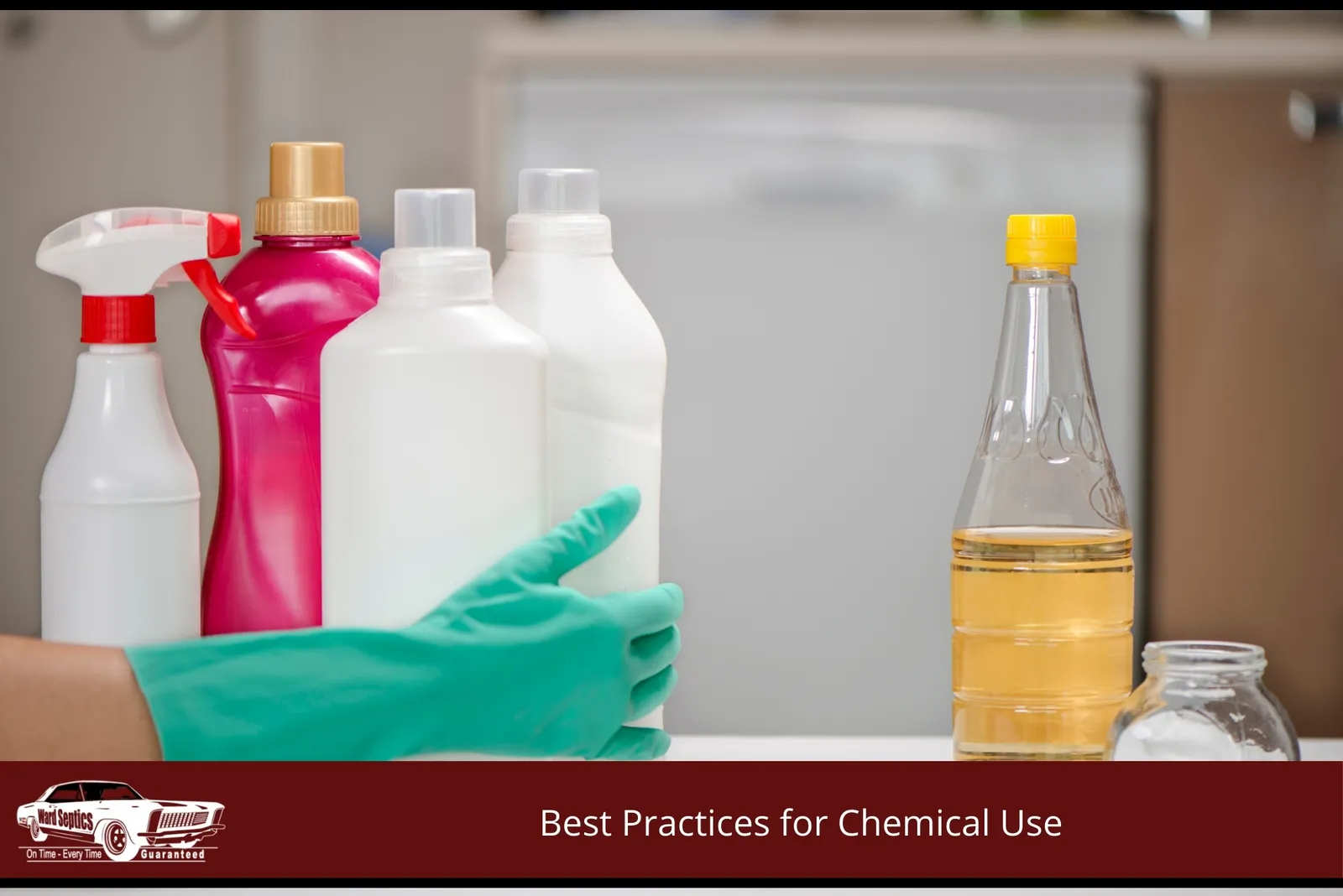 A hand with green gloves and bottles of chemicals for cleaning.