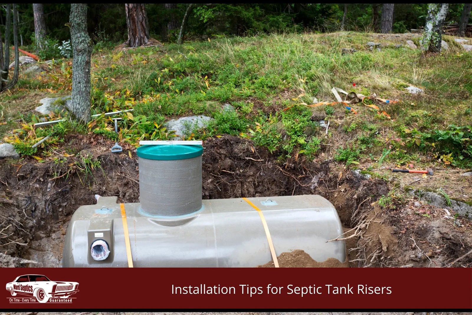 A concrete septic tank with a prominent grey riser and green lid sits in a dirt excavation site.