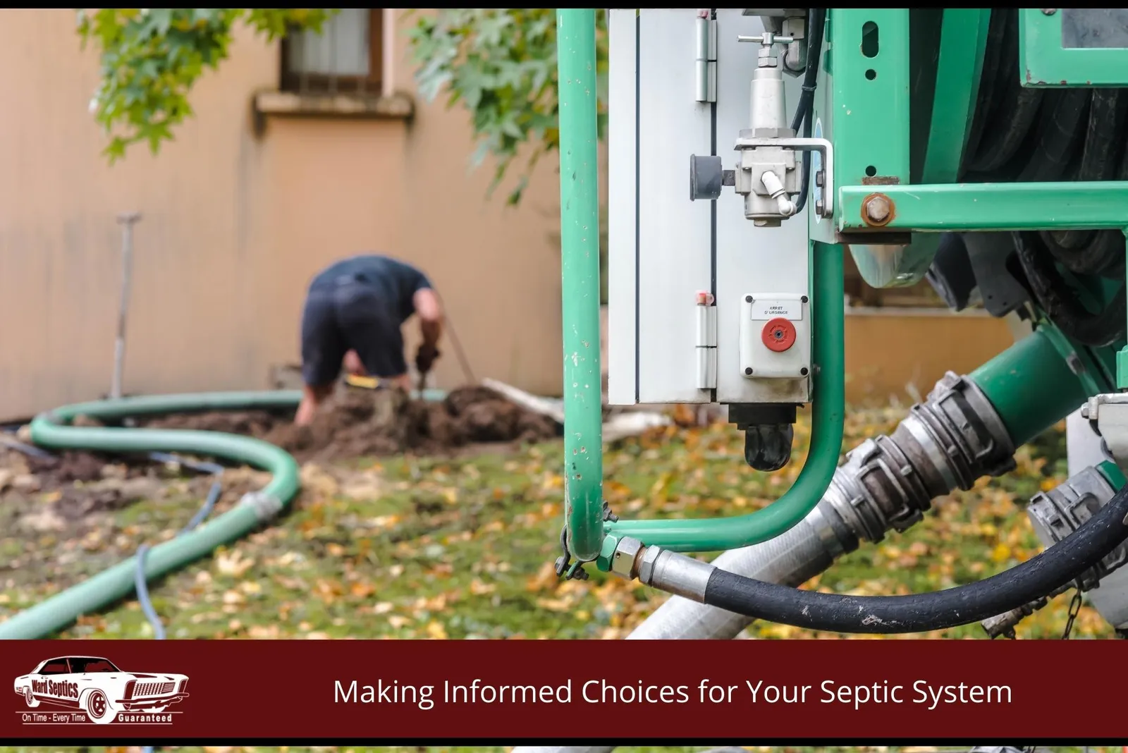 A green septic service vehicle with heavy hoses and machinery in the foreground.