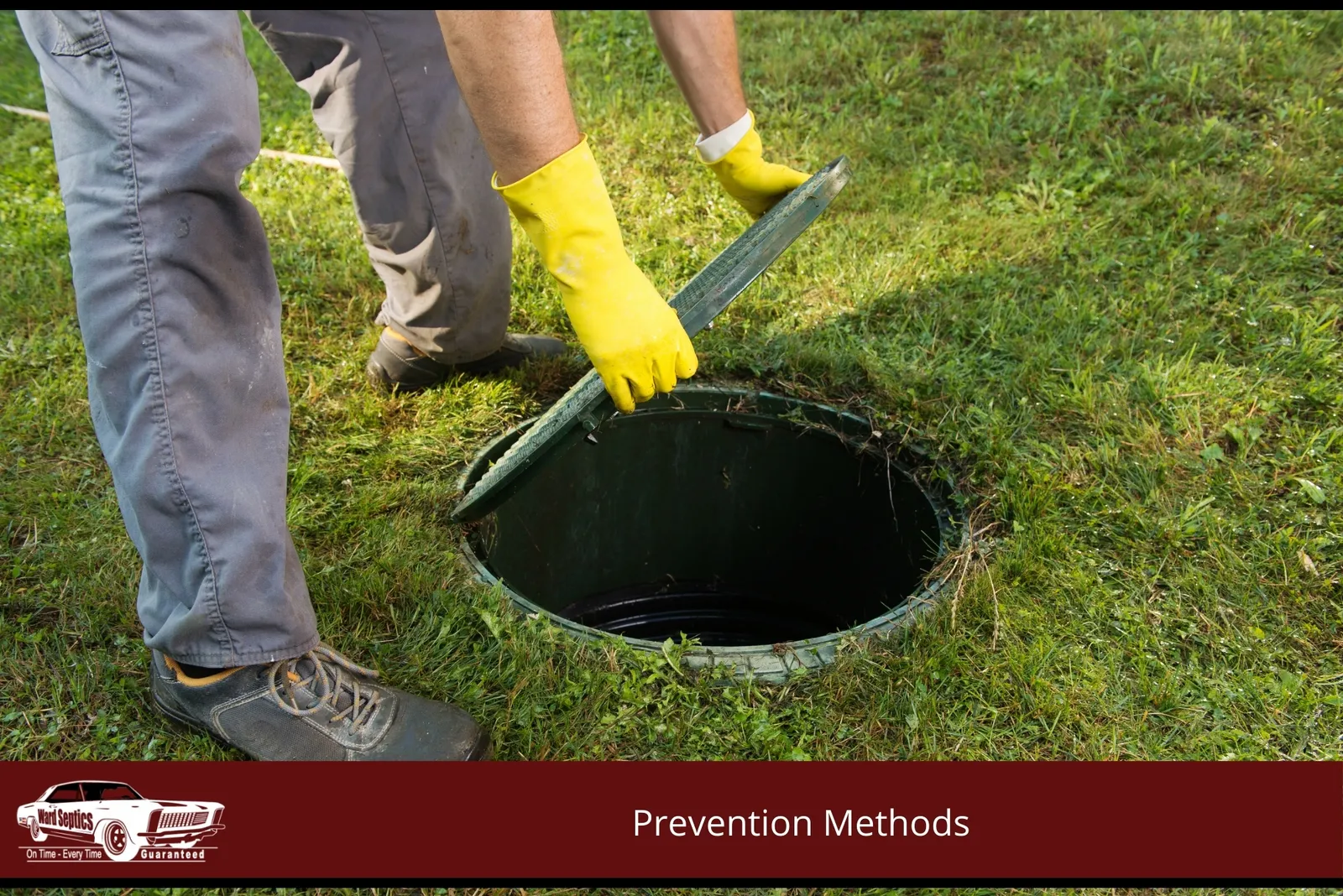 A person wearing yellow protective gloves lifts the green lid of a septic tank riser embedded in a grassy lawn.