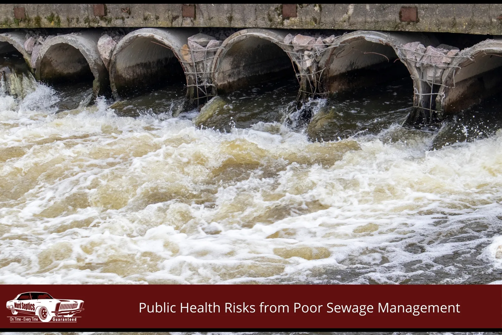 Turbulent, foamy wastewater gushes forcefully out of a row of large concrete culvert pipes beneath a roadway structure.