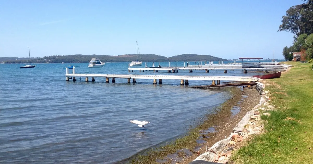 Jetties and moored boats on the lake at Toronto on a clear day
